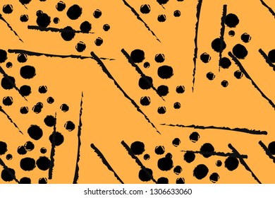 Bright seamless pattern of yellow color with graphic spots and strokes.EPS10