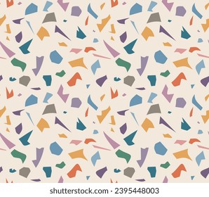 Bright seamless terrazzo pattern of colorful specks on neutral backdrop. Abstract geometric vector background of broken pieces.