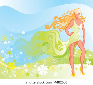 The bright sexy girl standing in the developing dress