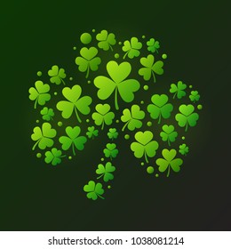 Bright shamrock made of small green shamrocks or clovers. Vector Saint Patrick's Day creative illustration