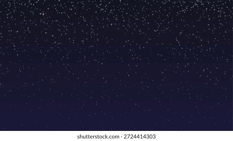 Bright snowflakes falling through dark blue night sky during calm winter snowfall