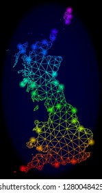 Bright spectrum mesh vector map of Great Britain with glow effect. Abstract lines, triangles, glare spots forms map of Great Britain on a dark background.