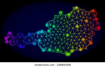 Bright spectrum mesh vector map of Austria with glare effect. Abstract lines, triangles, light spots forms map of Austria on a dark background.