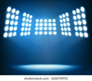 Bright spotlights on dark blue background night sky