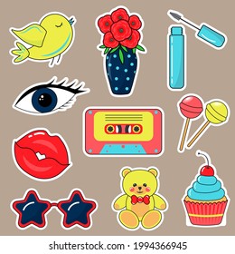 Bright stickers set in 80s-90s pop art comic style. Fashion Patch Badges with cassette, glasses, vase with flowers, bear, lips, eye, cupcake, chupa-chups, mascara, bird. 