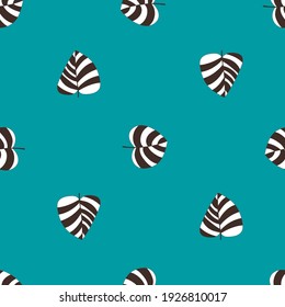 Bright summer mood seamless pattern with leaves vector. Tropical striped leaves on peacock color background dot pattern. Positive bold colors endless floral texture. Minimalistic peacock color pattern