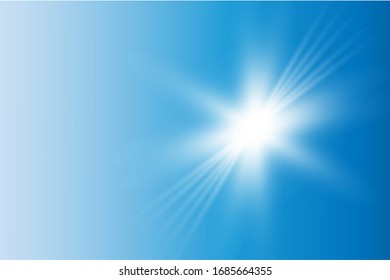 El sol brillante en un cielo azul brilla con rayos.