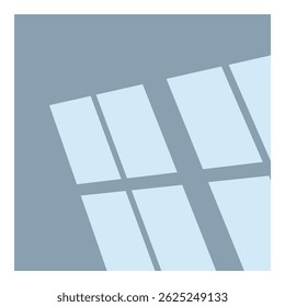Bright sun rays coming inside through window, making geometrical shapes on blue wall