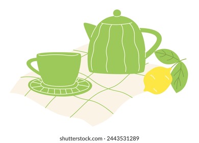 Bright teapot and cup set with hot tea and lemon