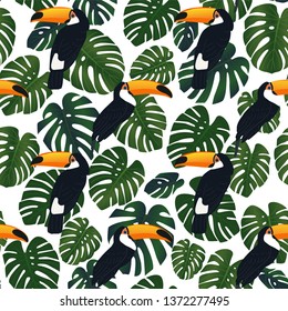 Bright tropical pattern, Hawaiian seamless print with monstera leaves and toucan birds. Vintage textile print.