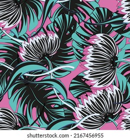 Bright tropical seamless pattern with flowers and palm leaves. Background for printing on paper and material.