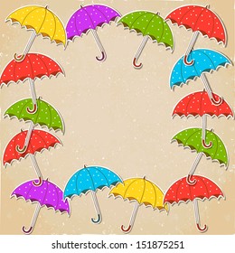 Bright umbrellas border frame with polka dot on vintage paper. Umbrella stickers