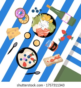 Bright vector flat illustration about picnic in cartoon style. Food and wine: berries, desserts, cheese, jam, toast, poke bowl with salmon and vegetables. Products for picnic on a striped tablecloth.