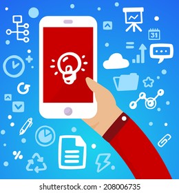 Bright vector illustration man's hand holding a large white phone with light bulb on a blue background with different financial icons