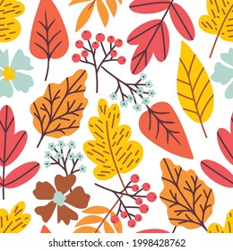 Bright vector seamless pattern for seasonal design. Red, yellow autumn leaves, blue, brown flowers, rowan berries on a white background. For print of fabric, textile products, stationery. School time.