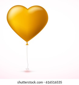 Bright yellow inflatable balloon in the shape of big heart with tape on white background. Greeting card for your friends, loved ones with a bouncy ball in form heart.