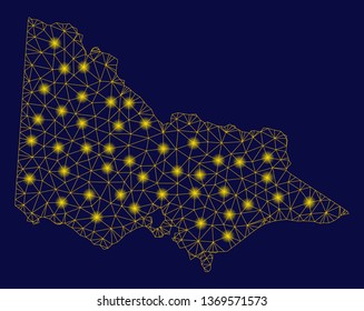 Bright yellow mesh Australian Victoria map with glow effect. Wire frame polygonal mesh in vector EPS10 format on a dark black background. Abstract 2d mesh created from polygonal grid, points,