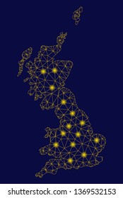 Bright yellow mesh Great Britain map with glare effect. Wire carcass triangular mesh in vector EPS10 format on a dark black background. Abstract 2d mesh designed with polygonal grid, spheric points,