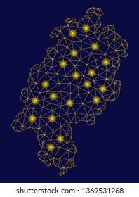 Bright yellow mesh Hesse Land map with glow effect. Wire carcass triangular mesh in vector EPS10 format on a dark black background. Abstract 2d mesh built from triangular lines, points,