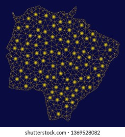 Bright yellow mesh Mato Grosso do Sul State map with lightspot effect. Wire frame polygonal mesh in vector EPS10 format on a dark black background. Abstract 2d mesh designed with polygonal grid,