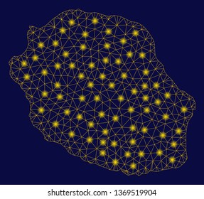 Bright yellow mesh Reunion Island map with glow effect. Wire carcass polygonal network in vector EPS10 format on a dark black background. Abstract 2d mesh designed with polygonal grid, round dots,