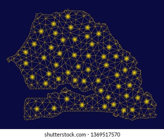 Bright yellow mesh Senegal map with glare effect. Wire carcass polygonal mesh in vector EPS10 format on a dark black background. Abstract 2d mesh created from polygonal grid, dots,