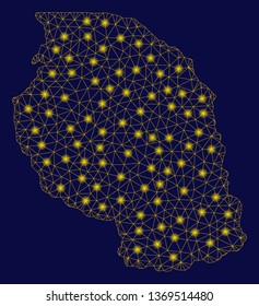 Bright yellow mesh Tanzania map with glow effect. Wire frame polygonal mesh in vector EPS10 format on a dark black background. Abstract 2d mesh built from polygonal grid, dots,