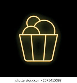 Bright yellow neon sign representing a bucket full of popcorn, glowing on a black background