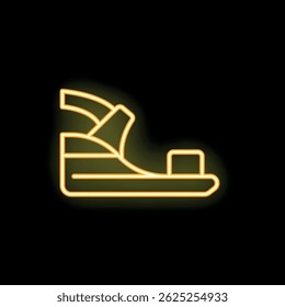 Bright yellow neon sign showing a platform sandal on a black background