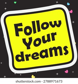 Bright yellow square sign with bold black text reading Follow Your Dreams tilted on a dark background accented by small stars and colorful hearts.