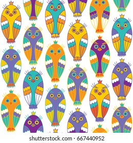 Brightly colored owls on a white background. Seamless pattern for fabric, wrapping or Wallpaper.