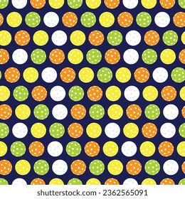 Brightly colored pickleballs on a navy background repeat pattern