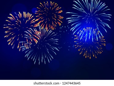 brightly colorful fireworks with pale smoke from fire on twilight background
