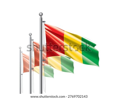 Brightly shining Guinean flags wave proudly on tall masts during official celebration events