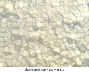 Brilliant background. Wavy, curved shape of yellow shade