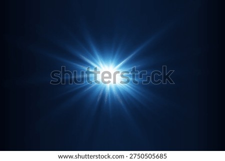 Brilliant central blue light creating lens flare and starburst effect on dark background