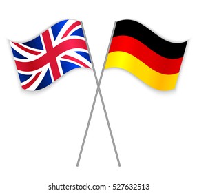 British and German crossed flags. United Kingdom combined with Germany isolated on white. Language learning, international business or travel concept.