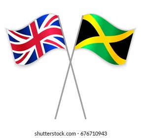 British and Jamaican crossed flags. United Kingdom combined with Jamaica isolated on white. Language learning, international business or travel concept.