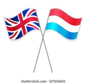 British and Luxembourg crossed flags. United Kingdom combined with Luxembourg isolated on white. Language learning, international business or travel concept.