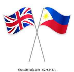 British and Philippine crossed flags. United Kingdom combined with Philippines isolated on white. Language learning, international business or travel concept.