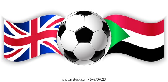 British and Sudanese wavy flags with football ball. United Kingdom combined with Sudan isolated on white. Football match or international sport competition concept.