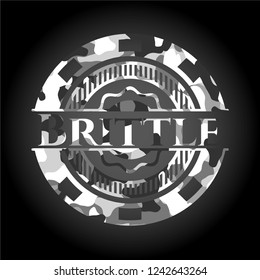 Brittle on grey camouflaged texture