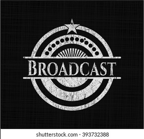 Broadcast chalkboard emblem on black board