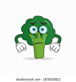 Broccoli mascot character with sad expression. vector illustration
