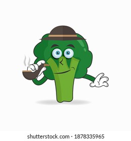 Tabaco de mascota de brócoli fumando. ilustración vectorial