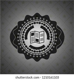 brochure icon inside black emblem