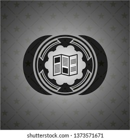 brochure icon inside black emblem. Vintage.