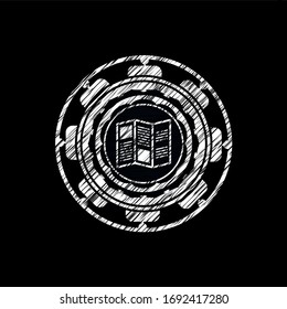 brochure icon inside chalkboard emblem written on a blackboard