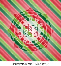 brochure icon inside christmas colors emblem.