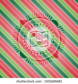 brochure icon inside christmas colors style badge.